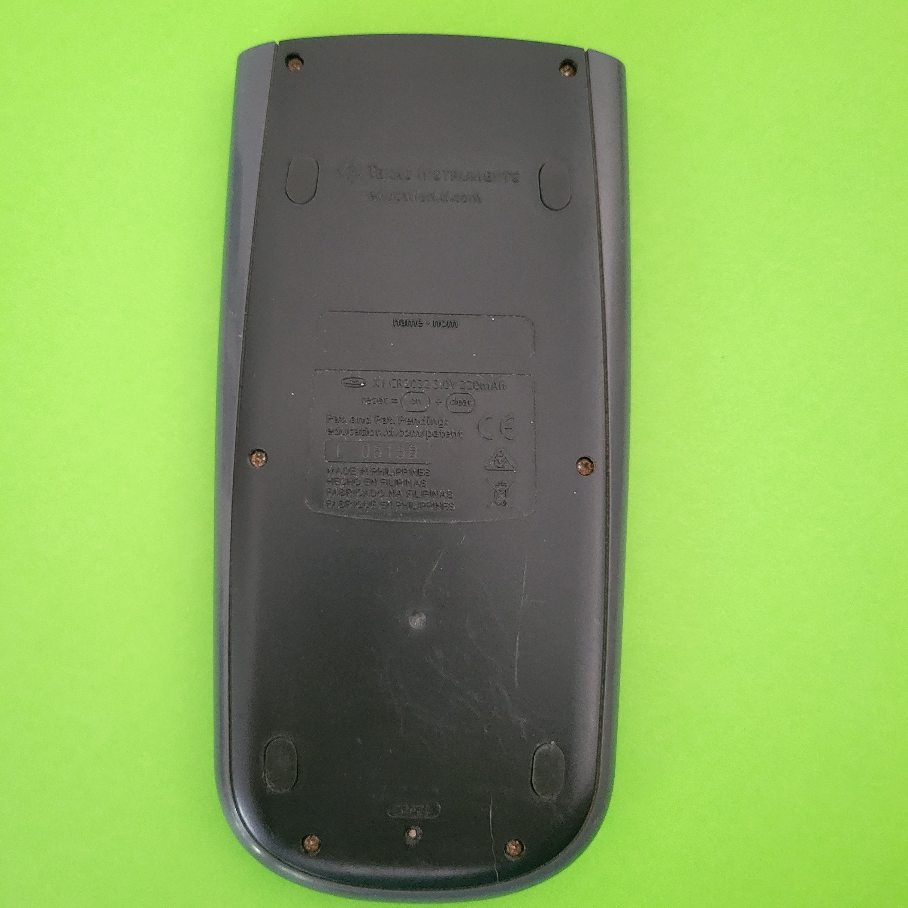 An image of the back of a texas instruments ti36xpro scientific/engineering calculator